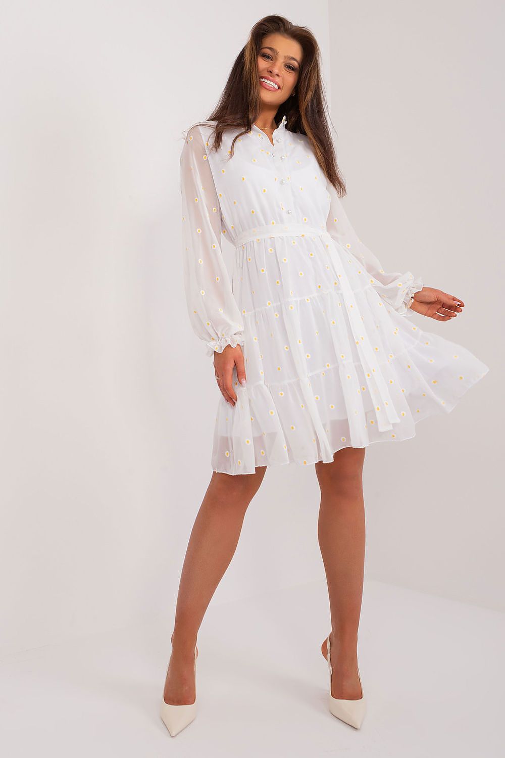 Elegant flared cocktail dress with ruffle sleeves and tie belt by Lakerta, featuring floral embroidery and a stylish silhouette.