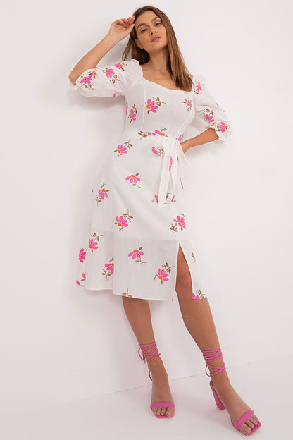 Elegant Floral Midi Summer Dress by Lakerta featuring a flared cut, ruffle sleeves, and a tie belt, styled with pink heels for a chic look.
