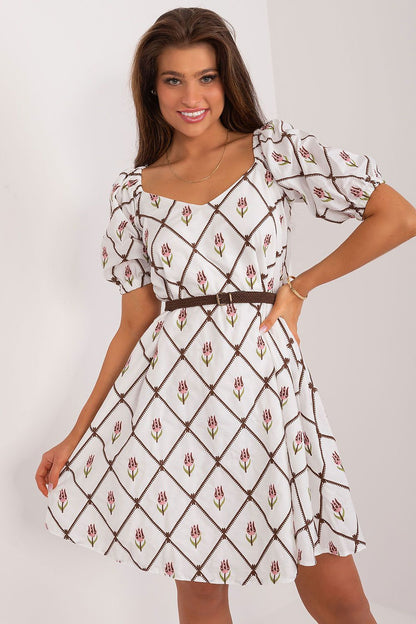 Elegant floral embroidered cotton summer dress by Lakerta, featuring flared cut, belted waist, and short puff sleeves, perfect for chic summer outings.