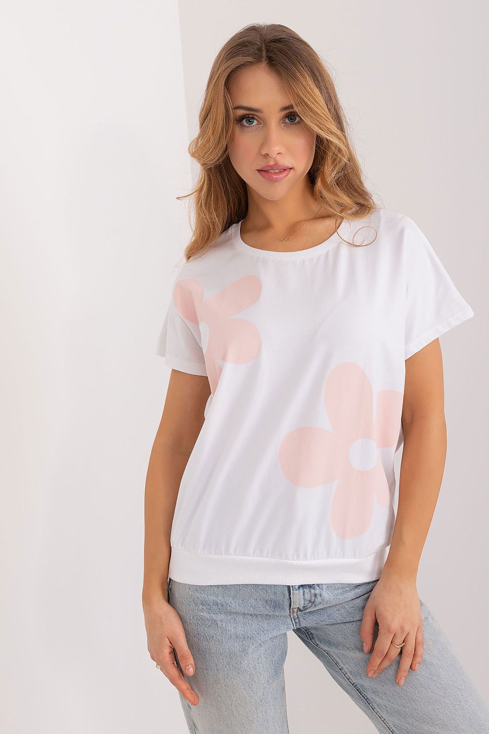 Charming Rue Paris cotton blouse with soft peach floral pattern, designed for luxury comfort and casual elegance, perfect for various everyday occasions.