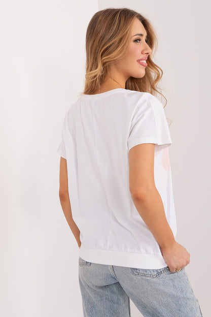 Back view of the chic Rue Paris casual cotton blouse, highlighting its smooth silhouette and relaxed fit, perfect for effortless summer style.