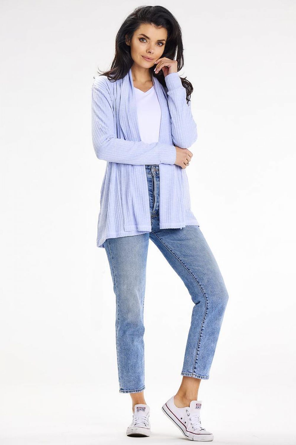 Elegant light blue loose-fit cardigan with a belt and shawl collar, complemented by fitted jeans, perfect for luxury casual wear in warmer evenings by awama.