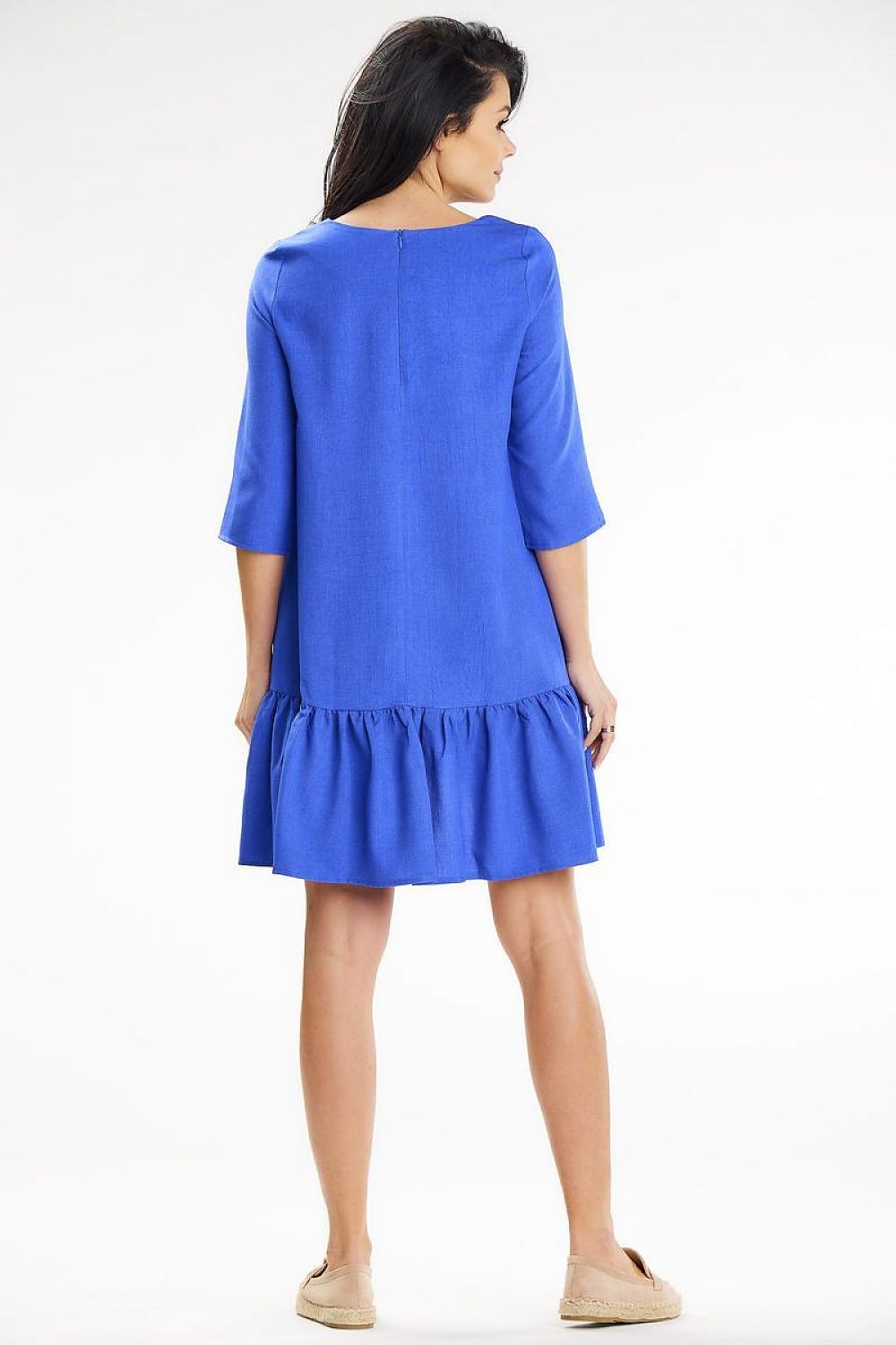 Luxurious Awama trapeze mini dress with frill accents and 3/4 sleeves, designed for comfort and style during summer days.