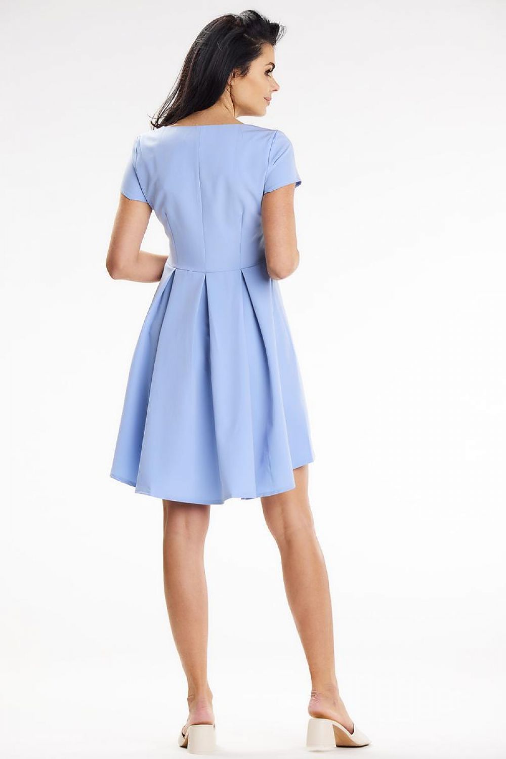 Stylish asymmetrical mini dress with contrasting pleats, designed by Awama, perfect for formal and casual events.