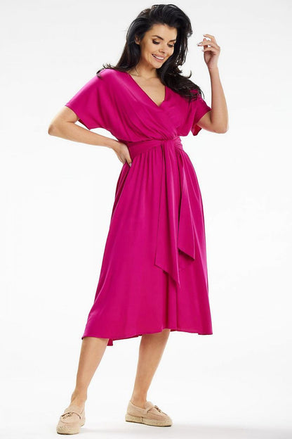 Elegant flared midi dress with envelope top and kimono sleeves by Awama, showcasing a stylish wrap design.