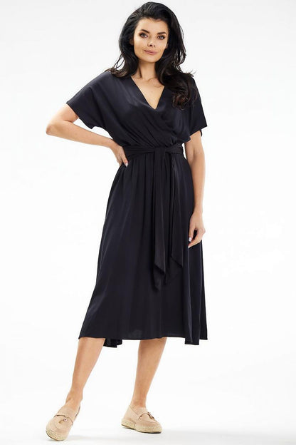Elegant flared midi dress by Awama, emphasizing its exquisite fabric and flattering fit, ideal for upscale occasions.