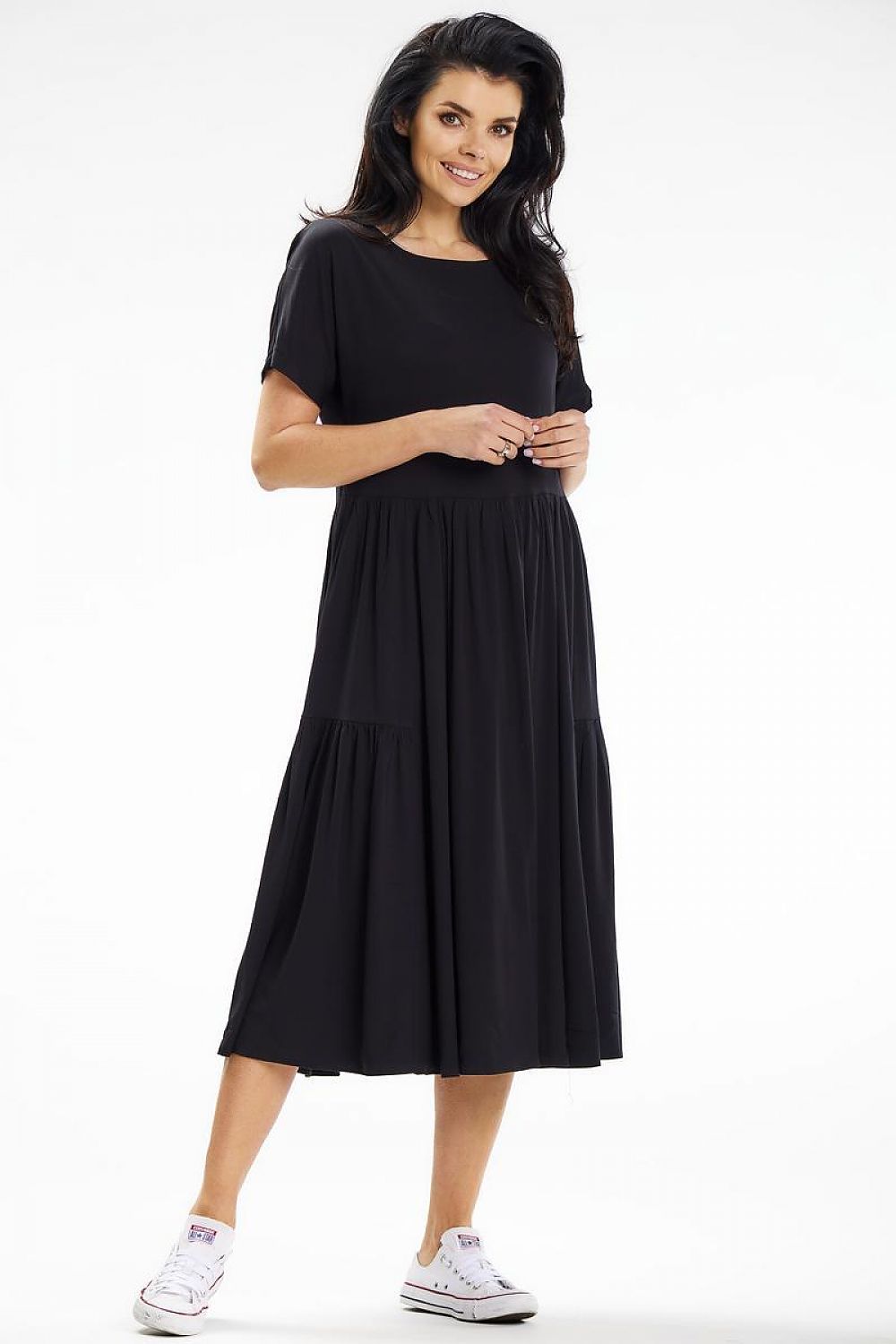 Awama loose midi dress displayed on a model, highlighting its comfortable fit and elegant design for summer outings.