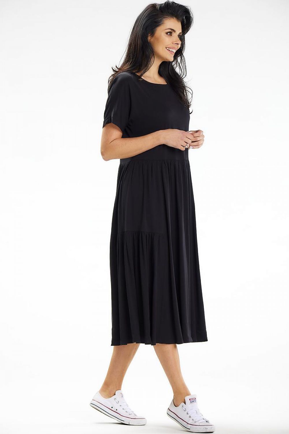 Awama summer dress with a boat neckline and soft fabric draping, exemplifying casual sophistication.