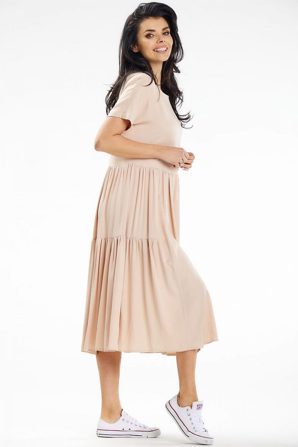 Luxurious Awama loose-fit midi dress with short sleeves, combining comfort and elegance for warm-weather gatherings.