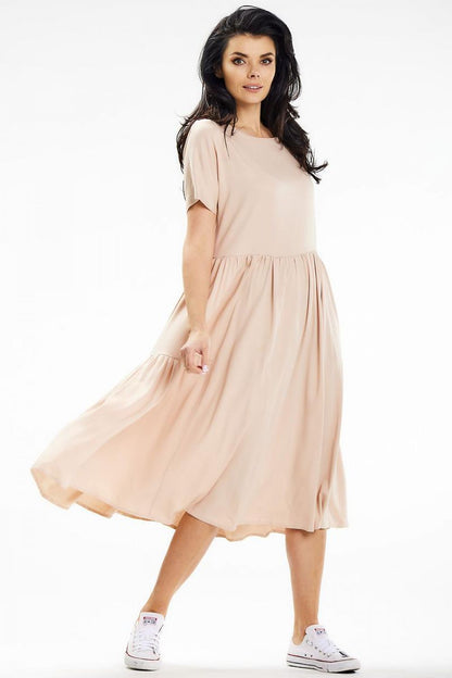 Chic and airy Awama summer midi dress in a flattering loose style, perfect for enhancing your seasonal wardrobe.
