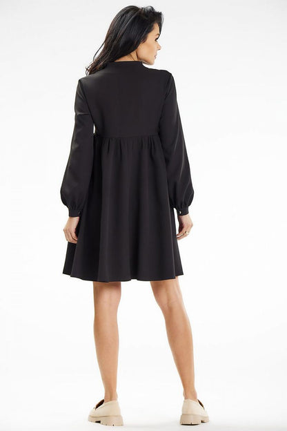 Elegant Awama stand-up collar mini dress featuring a deep neckline and long sleeves, perfect for special occasions.