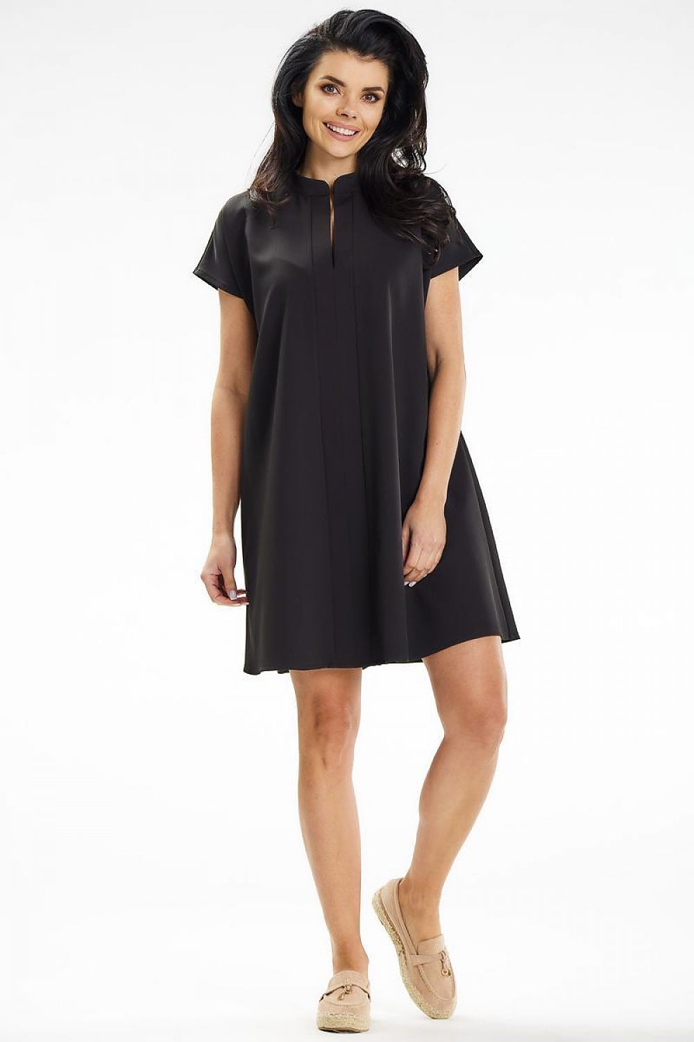 Stylish Awama short sleeve trapeze mini dress with a stitched front and flattering silhouette, ideal for elegant occasions.