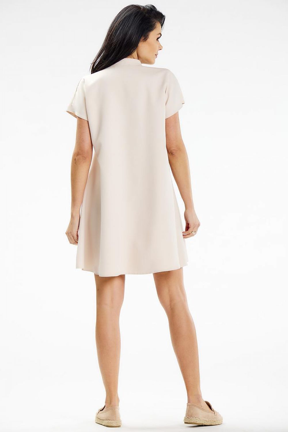 Elegant trapeze mini dress by Awama featuring a sophisticated stand-up collar and striking slit neckline, perfect for chic outings.