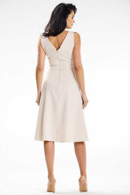 Awama's elegant strapless midi dress, featuring a refined design perfect for theatre nights or special celebrations.