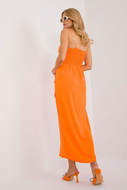 Elegant Italy Moda Summer Chic Pencil Dress featuring a decorative flower at the waist and a sensual thigh-high slit, perfect for a luxurious summer outing.