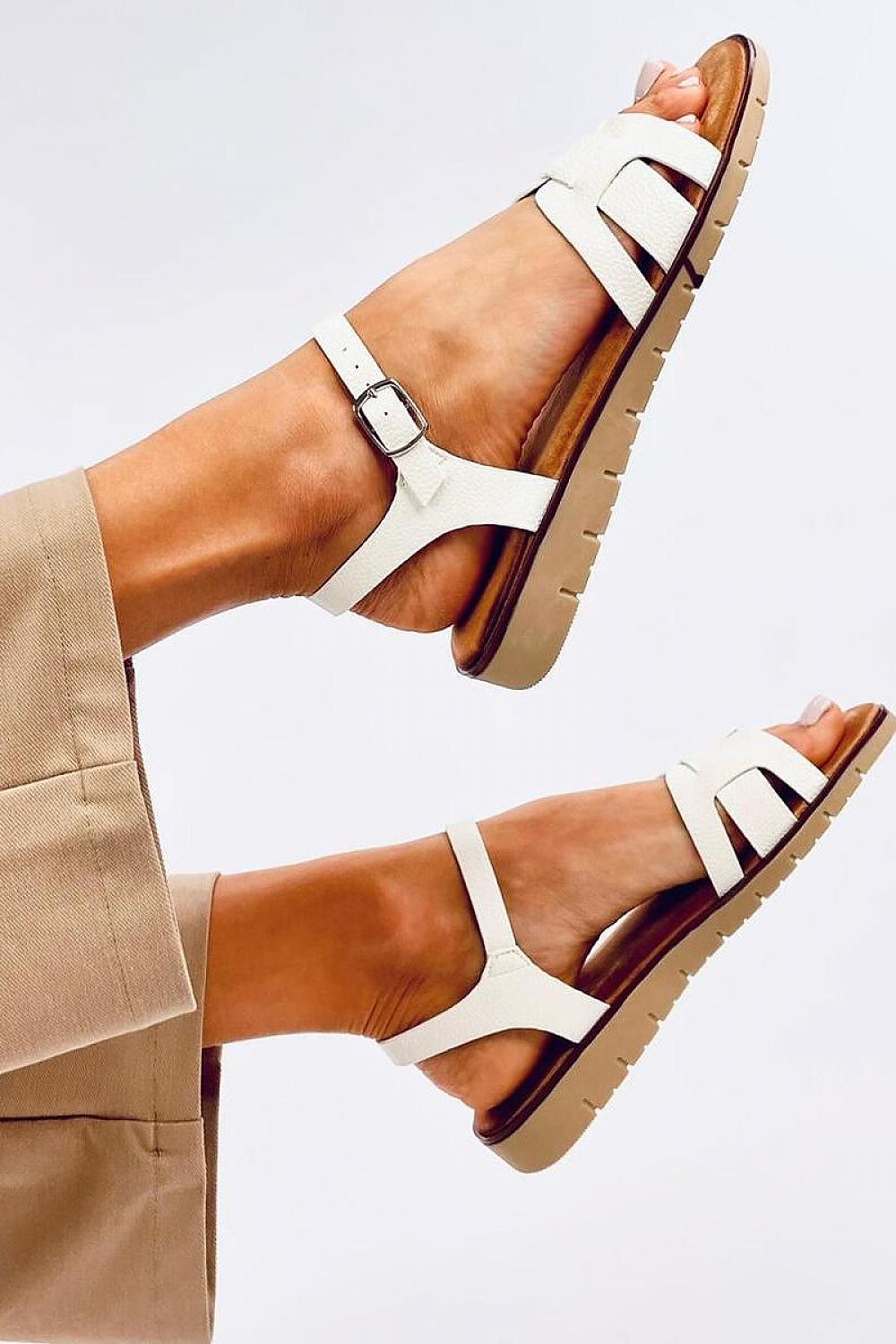Chic Inello eco-leather sandals for women, featuring a 2.5 cm rise and beautifully crossed straps for a luxurious look.