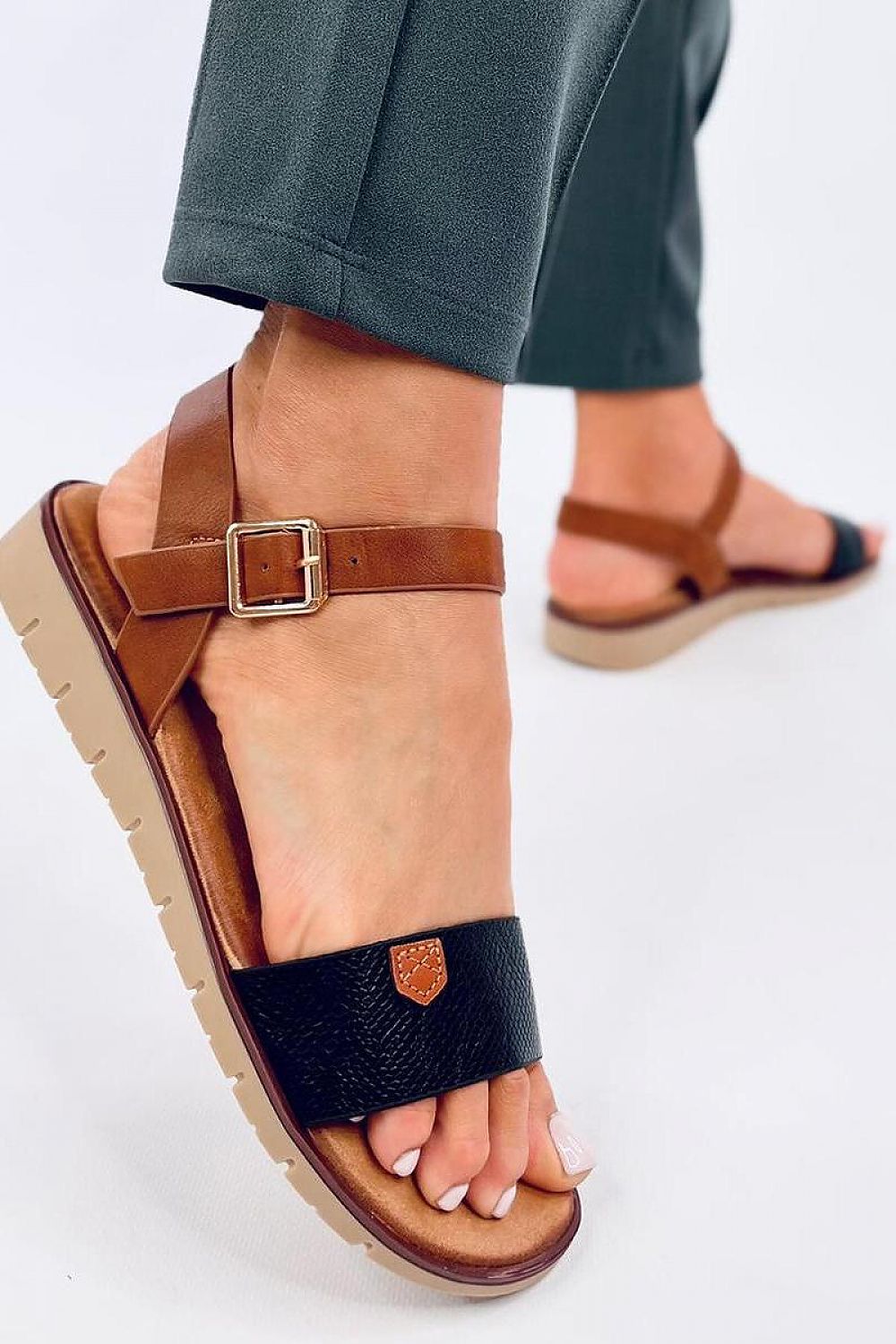 Inello eco-conscious women's sandals with a sophisticated snake skin motif, designed for comfort with a modest 2.5 cm heel, perfect for fashion-forward women.