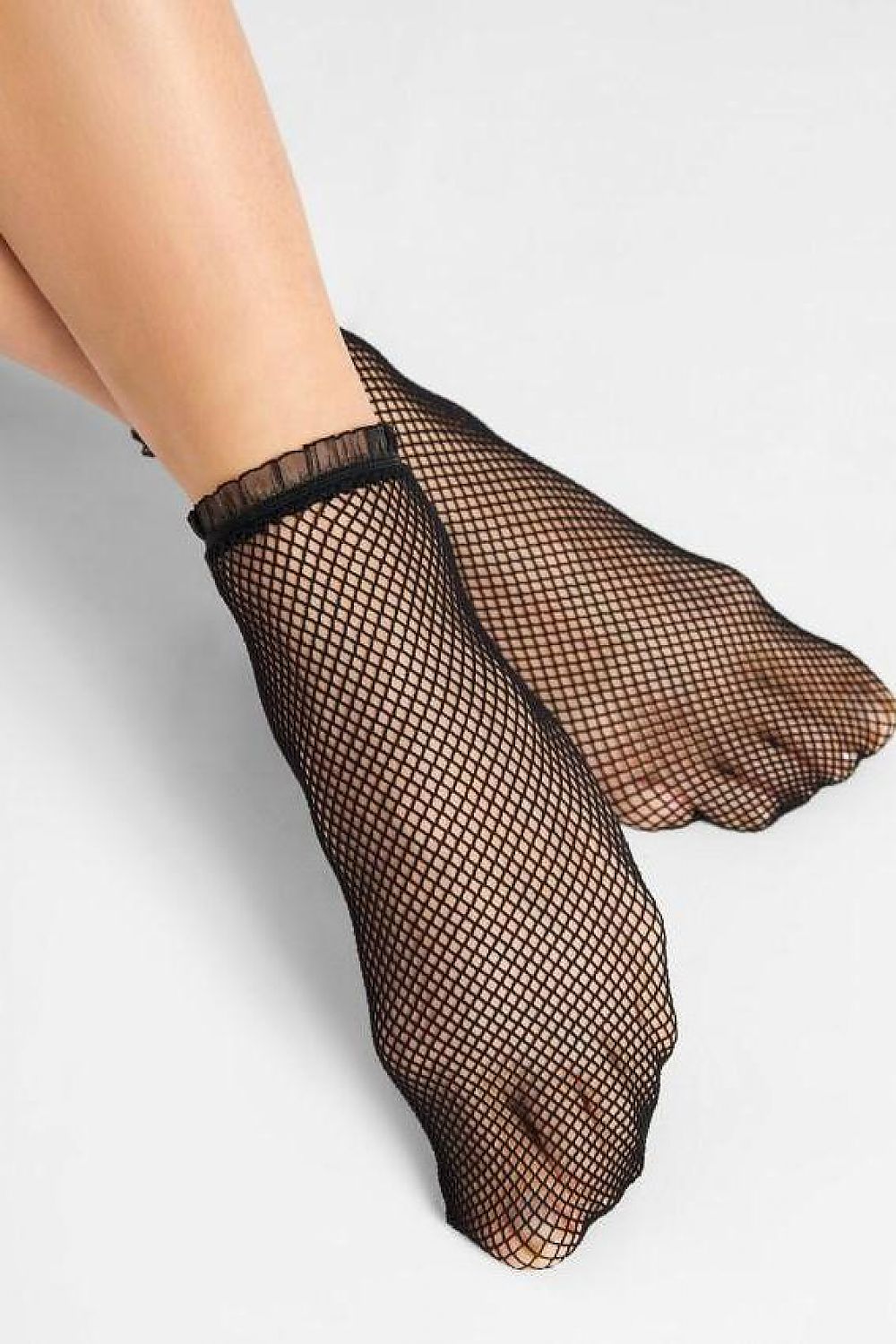 Elegant openwork cabaret socks by Fiore featuring decorative organza lace for a luxurious touch and comfortable mesh design.