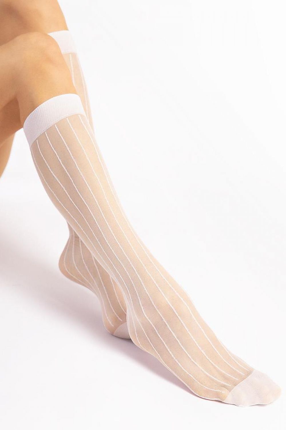 Close-up of Fiore knee high socks showcasing exquisite stripe design, perfect for achieving a sophisticated style.