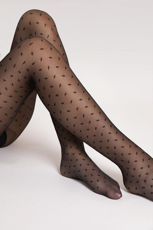 Close-up of Fiore Fashion Tights featuring intricate diagonal accents and fine mesh, inspired by the fashion legacy of Olivia Newton-John, ideal for adding a chic touch to any outfit.