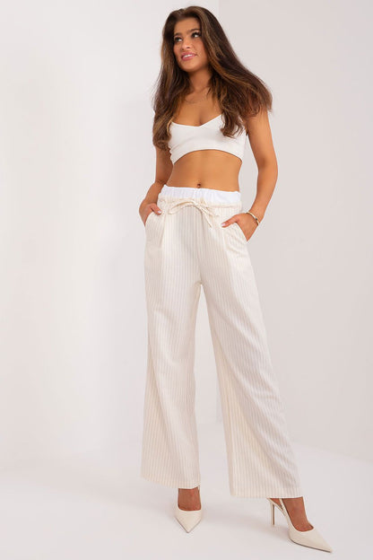Chic high-waisted palazzo trousers by Italy Moda with decorative darts and slip-in side pockets, ideal for both casual and formal events.