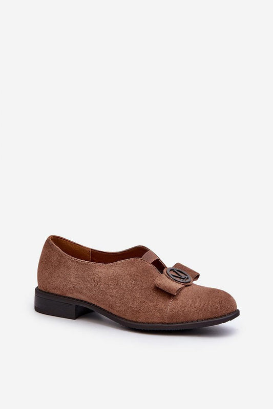 Close-up view of Step in Style's eco-suede elegant half shoes for women, showcasing the low heel and luxurious leather insole for superior comfort.