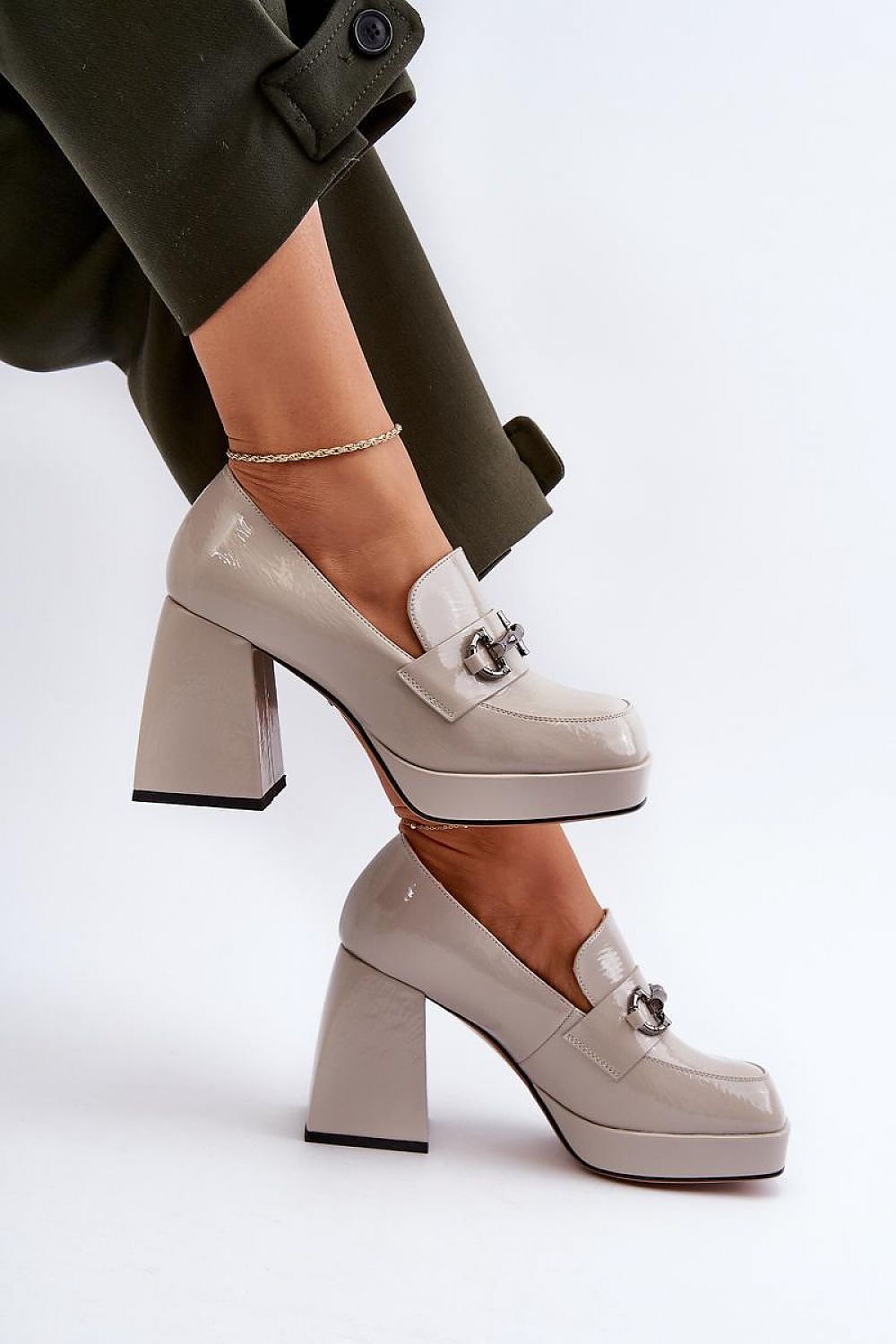 Side profile of elegant low shoes with chunky heels by Step in style, featuring a modern square toe and decorative straps, ideal for both casual and formal wear.