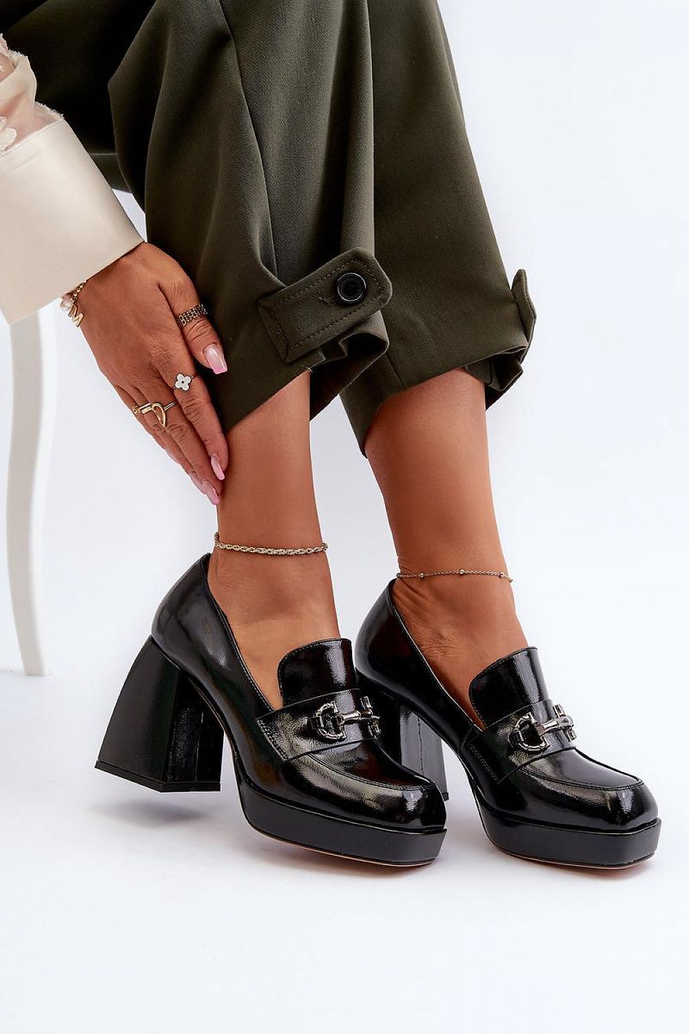 Stylish flat lay of Step in style's eco leather chunky heeled low shoes, highlighting their elegant design and craftsmanship, suitable for fashion-forward individuals.