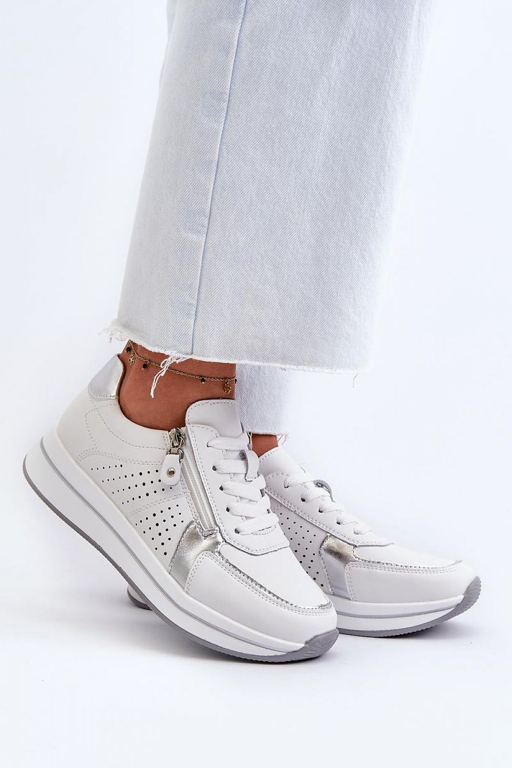 A pair of luxury women's natural leather sneakers with a comfortable 2.5cm platform and sturdy heel support by Step in Style, perfect for stylish everyday wear.