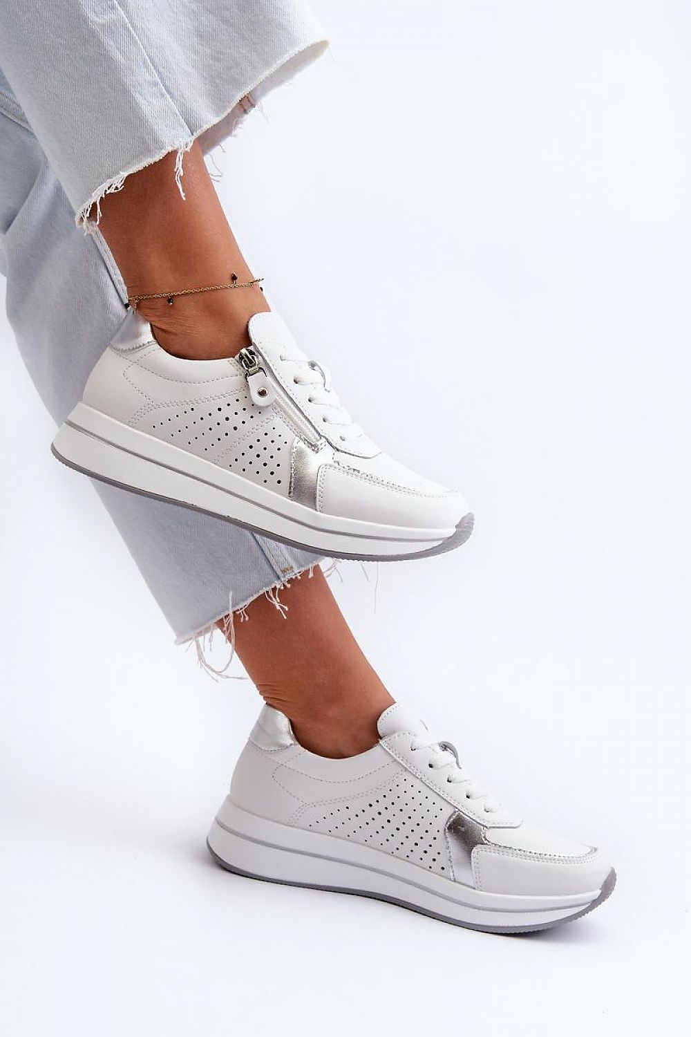 Elegant pair of luxury women's natural leather sneakers by Step in style, showcasing a combination of chic aesthetics and superior comfort with a reinforced heel support.