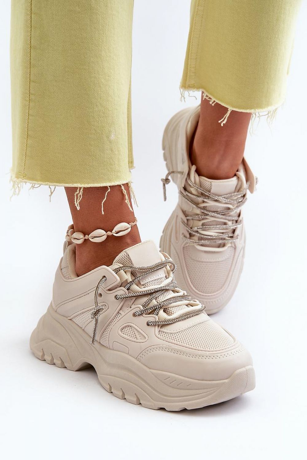 Fashion-forward women's platform sneakers by Step in Style, designed for ultimate comfort with a distinctive decorative lacing detail.