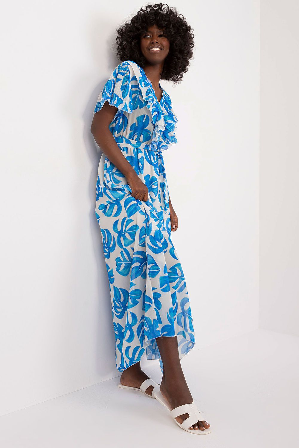 Maxi length summer dress by Italy Moda, accentuated with a tie belt that defines the waist and enhances a graceful silhouette.