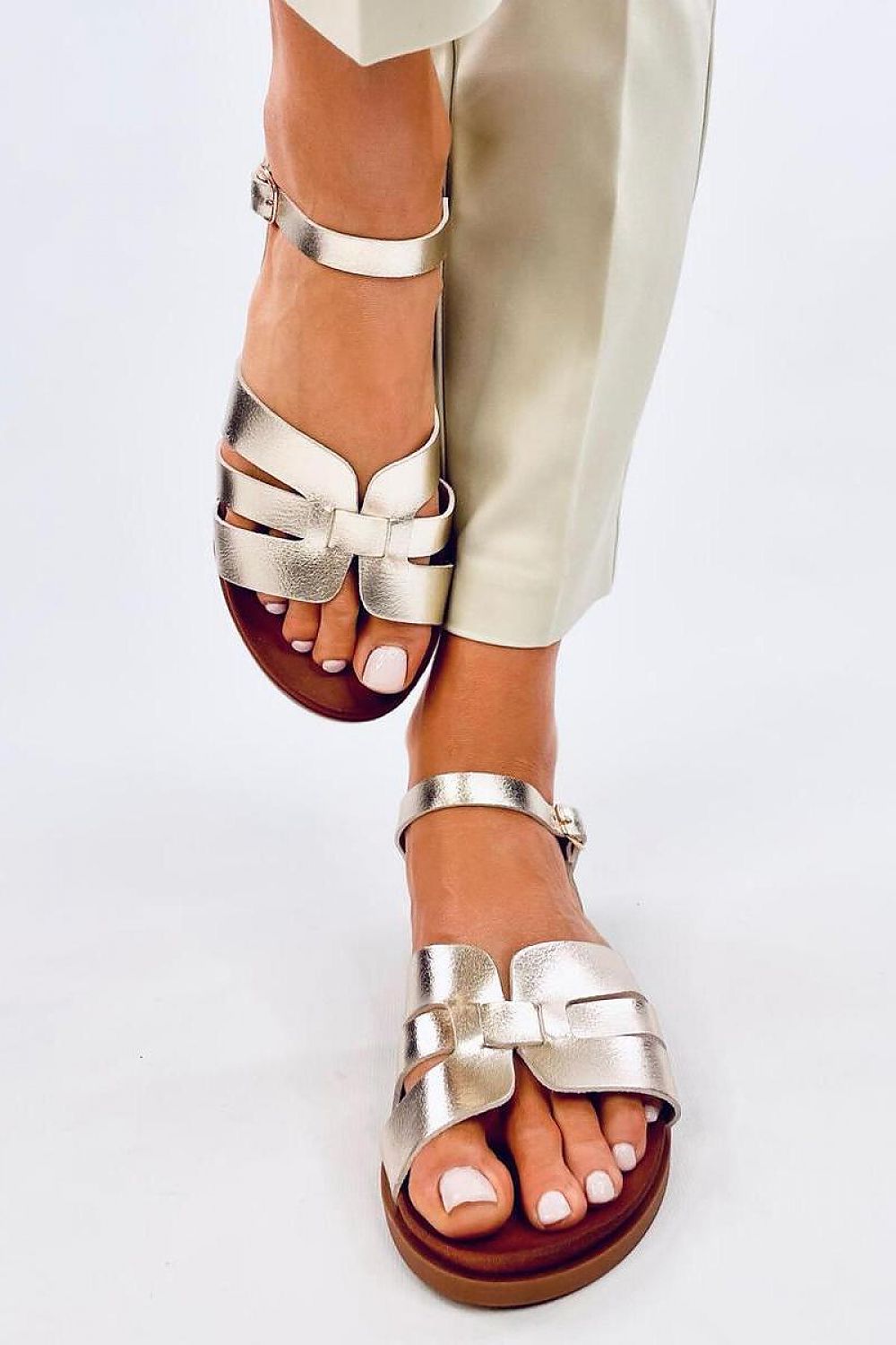 Stylish Inello Women's Elegant Flat Sandals on a flat sole, designed for comfort and sophistication, perfect for any casual outing.