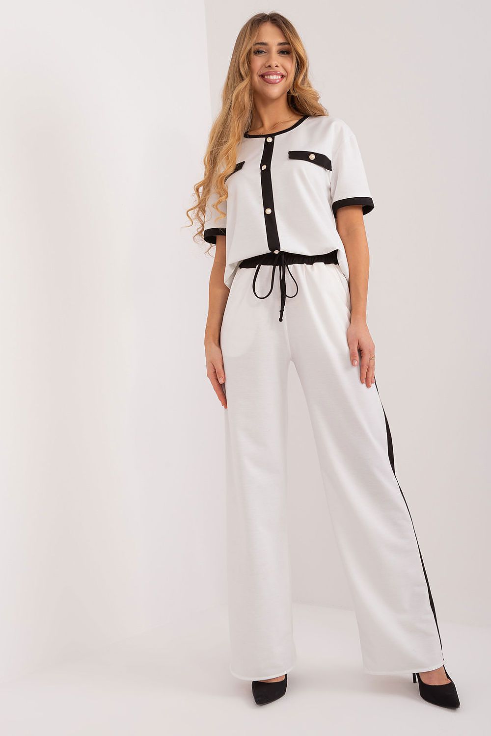 The sophisticated round neckline of Lakerta's cotton blouse, ideal for versatile styling in professional settings.