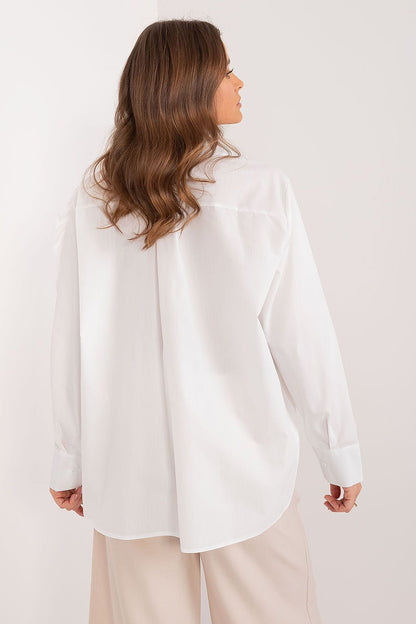 Close-up of the decorative flower embellishment on Lakerta's Women's Long Sleeve Cotton Shirt, emphasizing unique style and elegance.