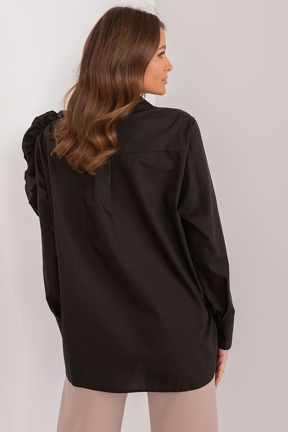 Elegant women's long sleeve cotton shirt by Lakerta featuring decorative flower detail.