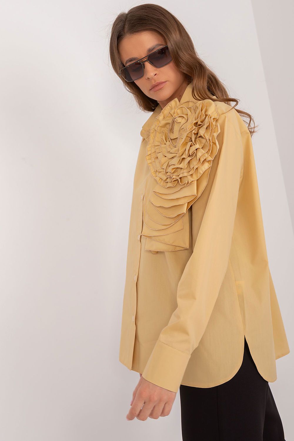 Stylish women's long sleeve shirt by Lakerta, made from high-quality cotton with elegant flower embellishment.