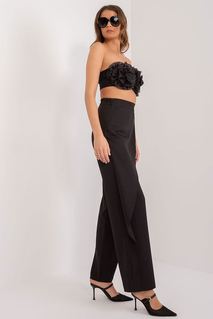 Versatile women’s trousers by Lakerta in a stylish setting, perfect for important meetings or upscale events.