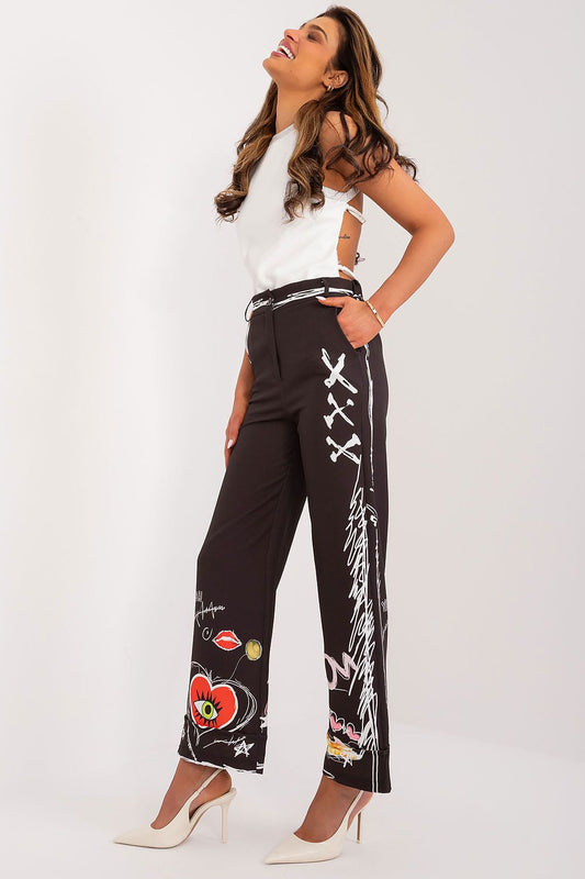 Elegant high-waisted trousers by Italy Moda featuring a vibrant colourful print, designed for comfort and style in a luxurious polyester and spandex blend.