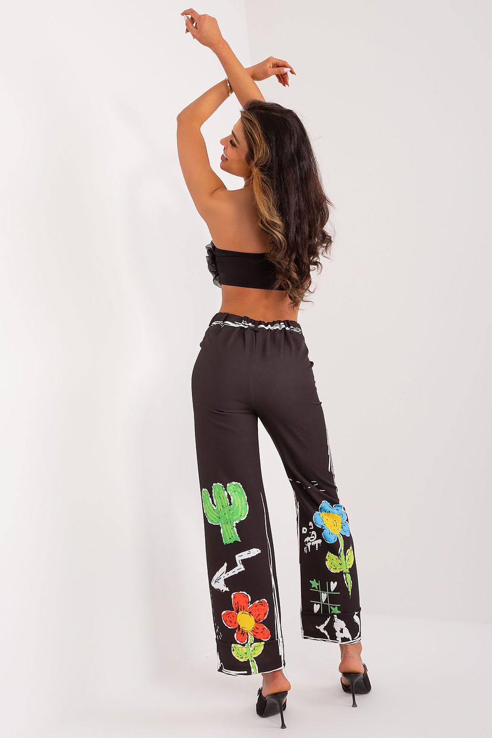 Luxurious polyester and spandex blend high-waisted trousers by Italy Moda, designed with a lively print and wide legs for ultimate comfort and style.