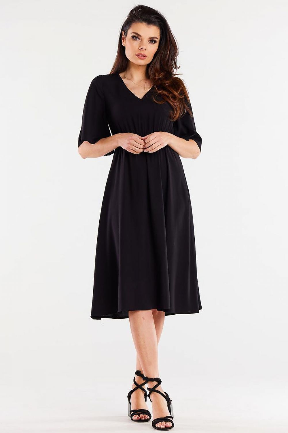 Stylish close-up of Awama's elegant flared daydress, showcasing the premium viscose fabric and elastic waist detail.