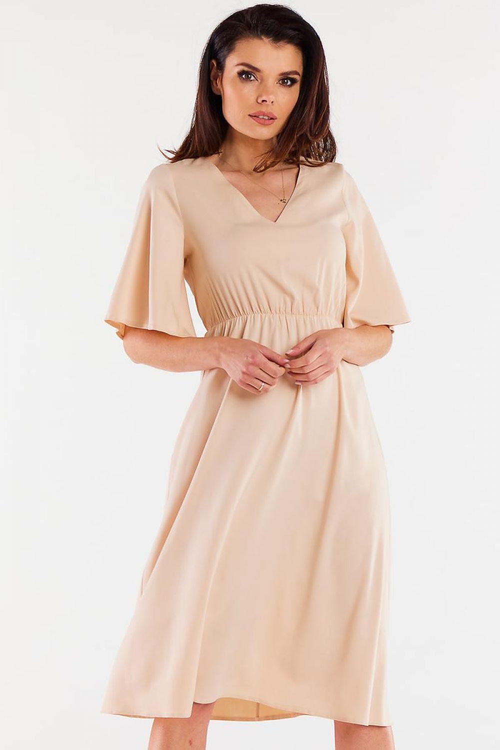 Rear view of the Elegant Flared Daydress by Awama, highlighting the flared silhouette and stylish wide sleeves, ideal for chic summer outings.