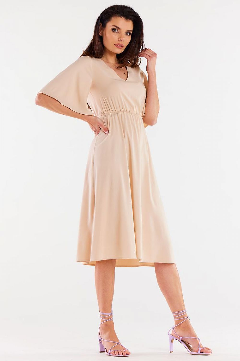 Elegant Flared Daydress by Awama designed in soft viscose, featuring an elastic waistband and wide sleeves for a luxurious fit, perfect for casual and formal occasions.