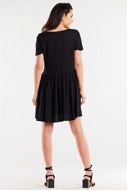 Chic Awama viscose dress design with a flattering ruffled hem and lightweight fabric, perfect for any elegant event.