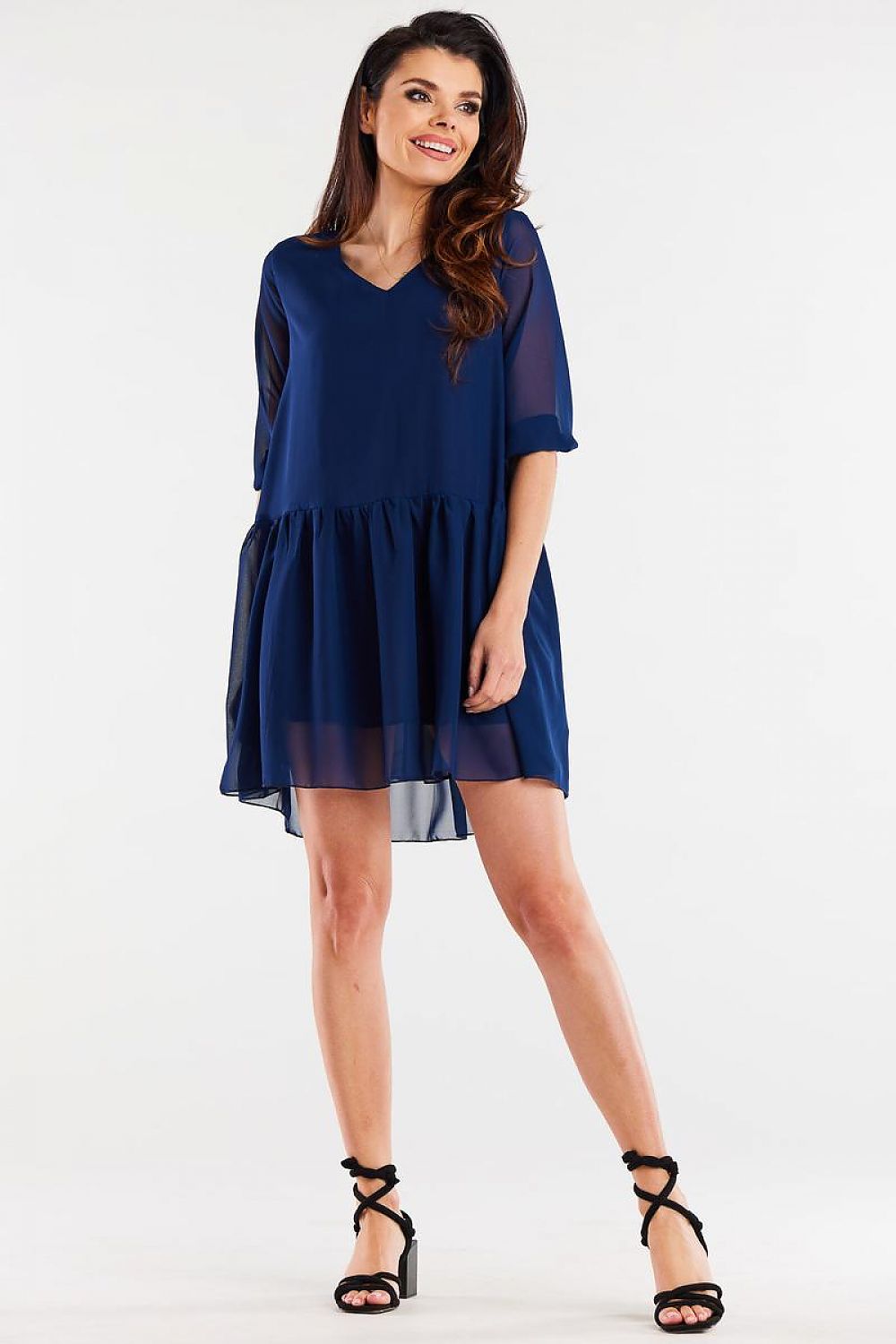 Close-up of the ruffle hem of the elegant loose chiffon daydress by Awama, showcasing its luxurious fabric and delicate design.