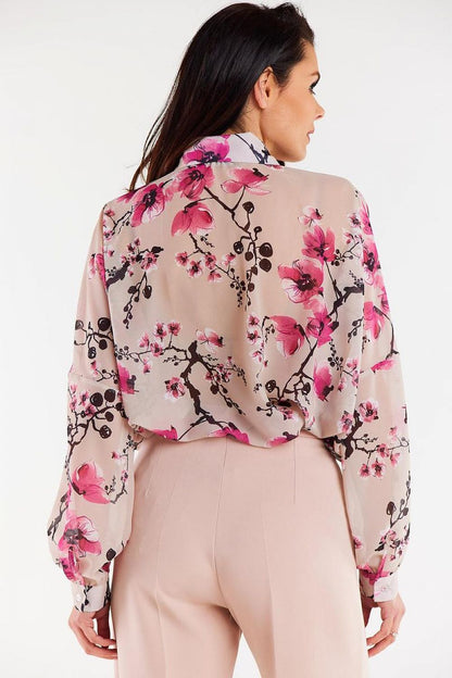 Full view of Awama's elegant oversized chiffon long sleeve shirt, featuring wide ruffled sleeves and a graceful silhouette ideal for formal occasions.