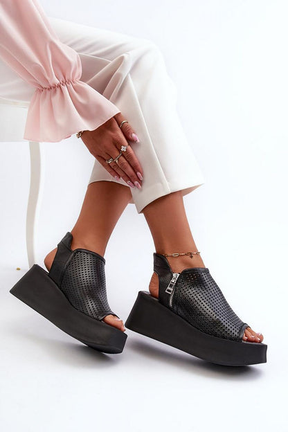 Stylish women's sandals in natural leather, showcasing a graceful openwork pattern and secure zipper closure, crafted by Step in Style.
