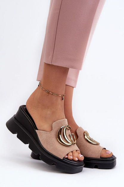 Vinceza Women's gold-detailed flip-flops in an elegant pose, demonstrating the perfect blend of style and comfort for summer walks.