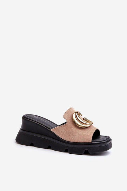 Showcasing Vinceza Women's elegant flip-flops with a chic gold decoration, designed for summer elegance and all-day comfort.