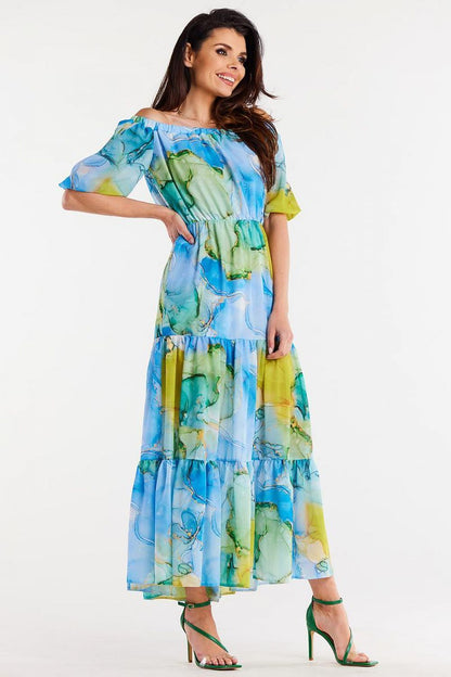 Awama's luxurious long chiffon dress displayed on a hanger, showcasing exquisite ruffles and premium quality fabric.